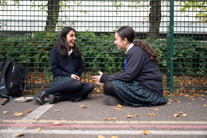 Pupils and teacher outside